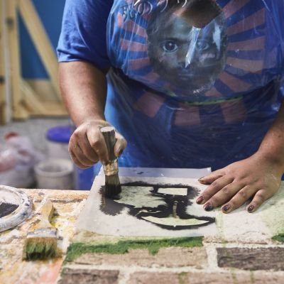 scenic artist in the workshop